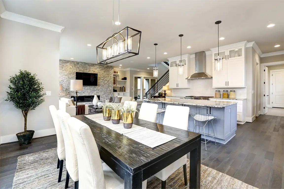 Beautiful kitchen in luxury modern contemporary home interior with island and chairs.