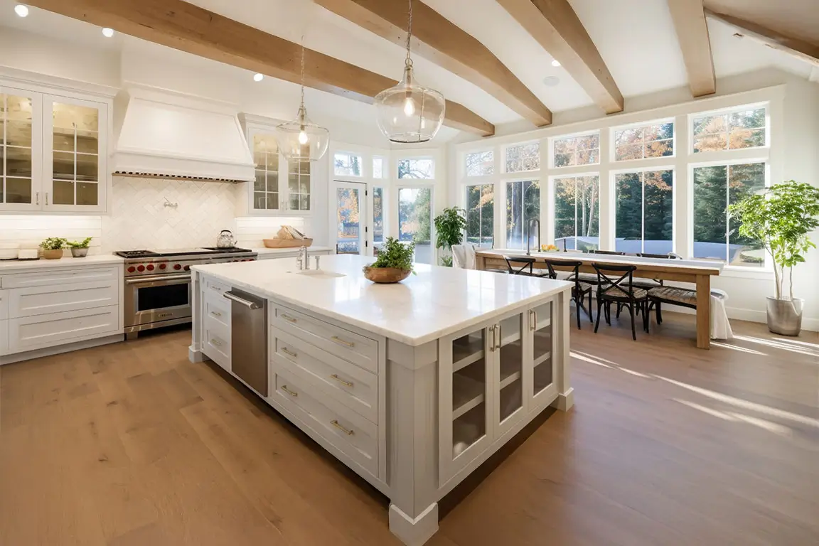 Kitchen interior in beautiful new luxury home with kitchen island and wooden floor, bright modern minimal style, with copy space.