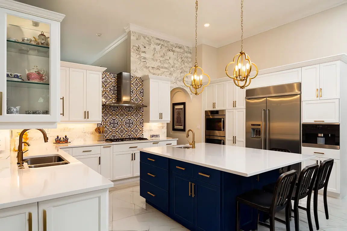 Modern white kitchen in a luxurious home.